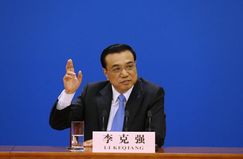 3月15日，國務院總理李克強在北京人民大會堂與中外記者見面，并回答記者提問。 新華社記者 沈伯韓 攝