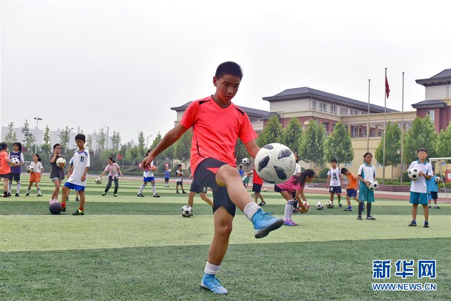 (特別的暑期生活·圖文互動)(1)文體活動豐富河南農村孩子暑期生活