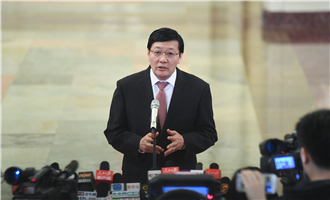 全國社?；鹄硎聲硎麻L樓繼偉接受采訪