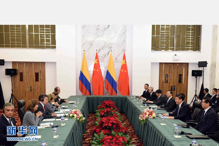 11月18日，國家主席習近平在菲律賓馬尼拉會見哥倫比亞總統桑托斯。 新華社記者 饒愛民 攝