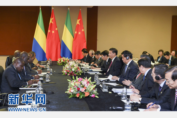 12月3日,國家主席習近平在約翰內斯堡會見加蓬總統邦戈。新華社記者 謝環馳 攝 12月3日,國家主席習近平在約翰內斯堡會見加蓬總統邦戈。新華社記者 謝環馳 攝