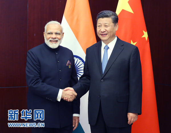 6月9日，國家主席習近平在阿斯塔納會見印度總理莫迪。 新華社記者姚大偉 攝